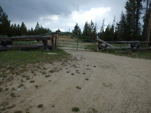 GDMBR: Old homestead styled fence with a modern ranch gate.